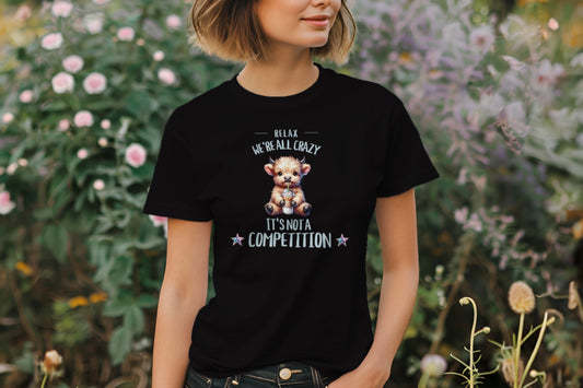 Funny Highland Cow T-Shirt – Relax We're All Crazy It's Not a Competition Tee – Cute Cow Humor – Farm Animal Mental Health Shirt.